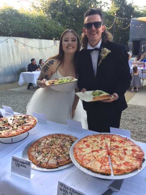 Bride & Groom at a wedding catered by pizzarageous