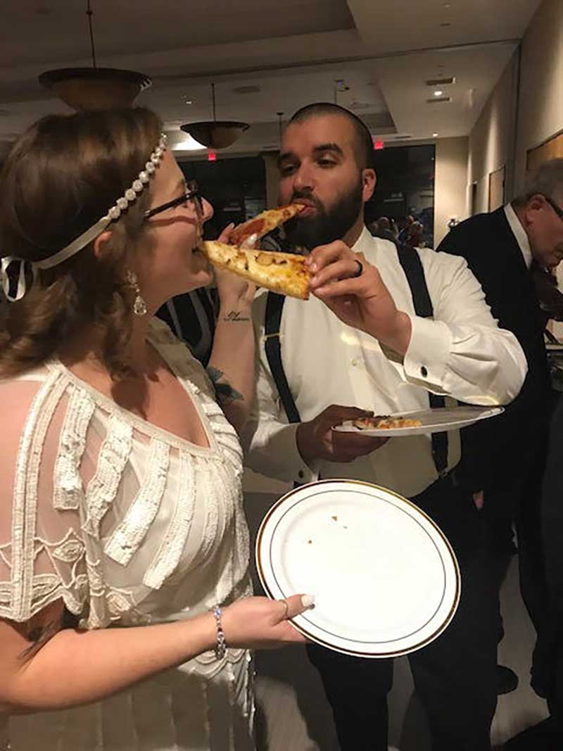 Feeding Pizza at Wedding